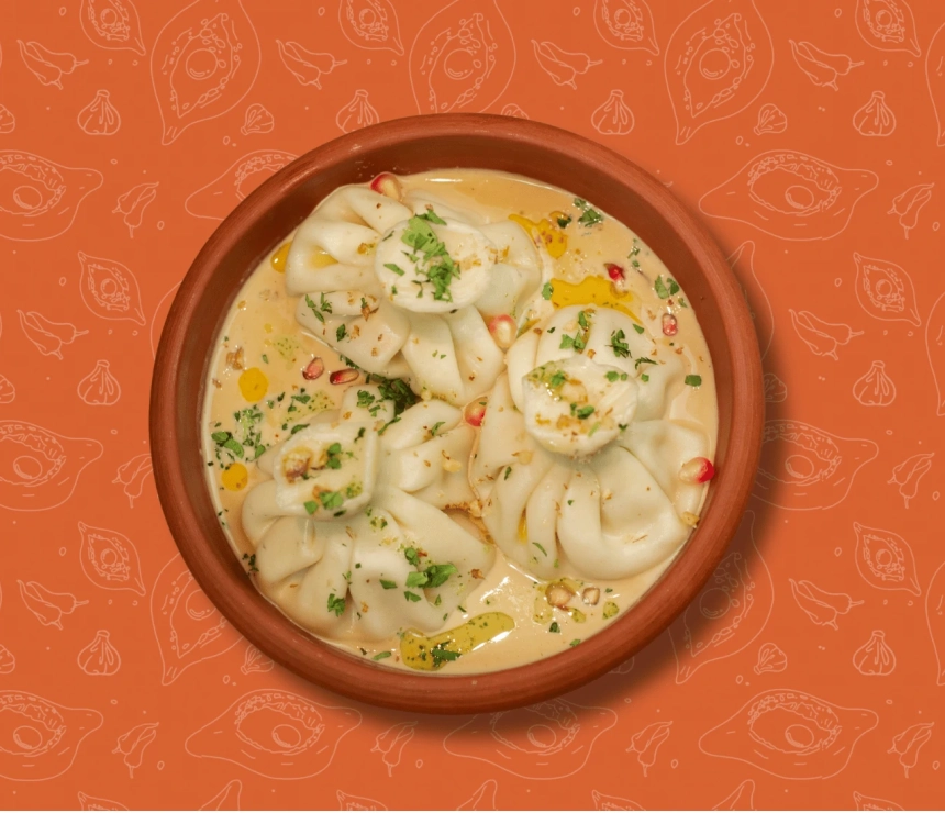 Khinkali in Chkmeruli sauce